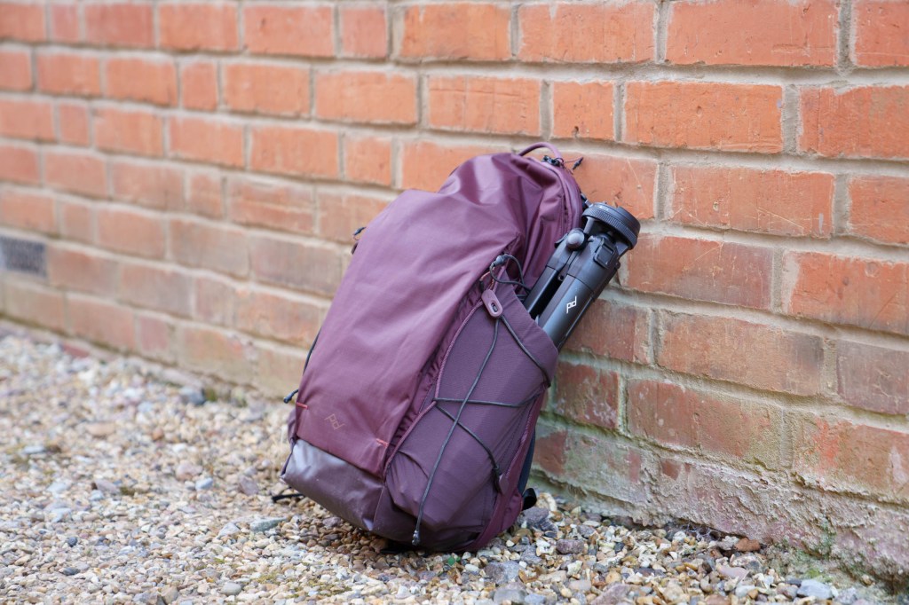 Peak Design Outdoor Backpack 18L side pocket with tripod. 