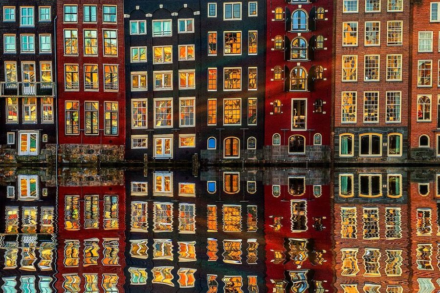 buildings at dusk in Amsterdam reflection