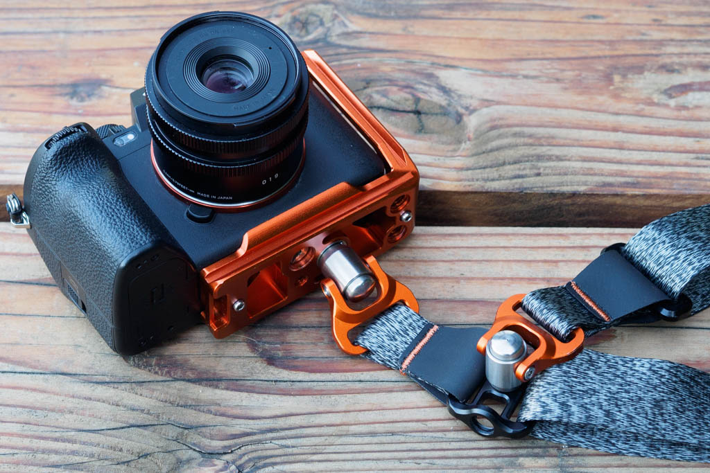 3 Legged Thing Axis 34 strap attached to Sony A7R V via L-bracket