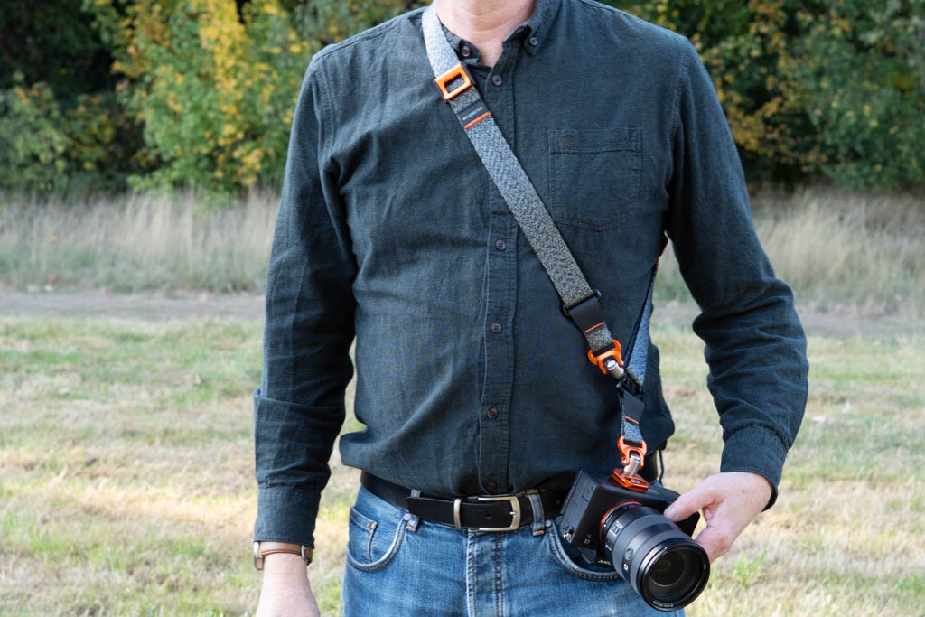 3 Legged Thing Axis 34 strap in cross-body mode
