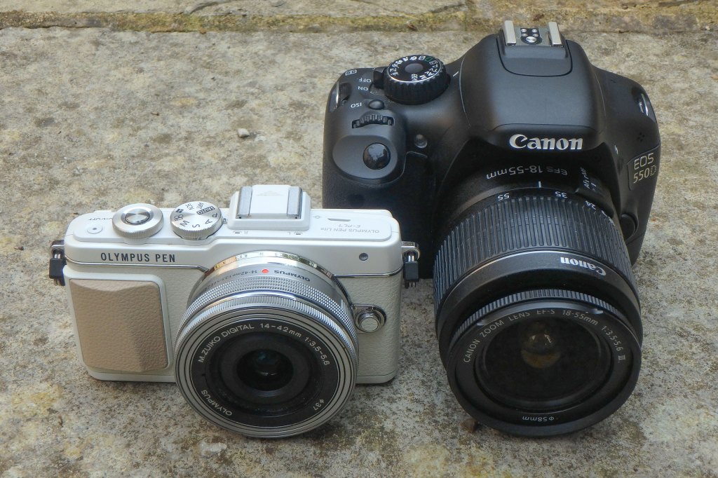 Canon EOS 550D DSLR next to Olympus PEN E-PL7. Image credit: Gavin Stoker