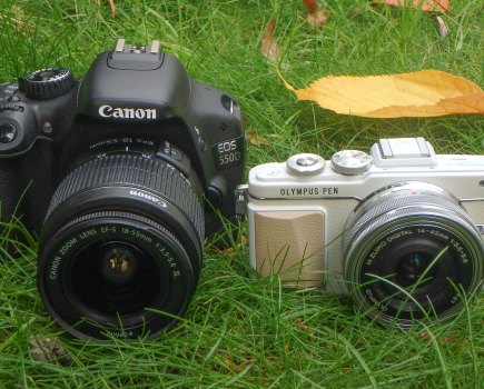 Canon EOS 550D DSLR next to Olympus PEN E-PL7. Image credit: Gavin Stoker