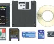 Storage devices down the digital ages: PC card, floppy disc, CompactFlash, SmartMedia, mini compact disc, memory stick card, SD card, and xD Picture Card