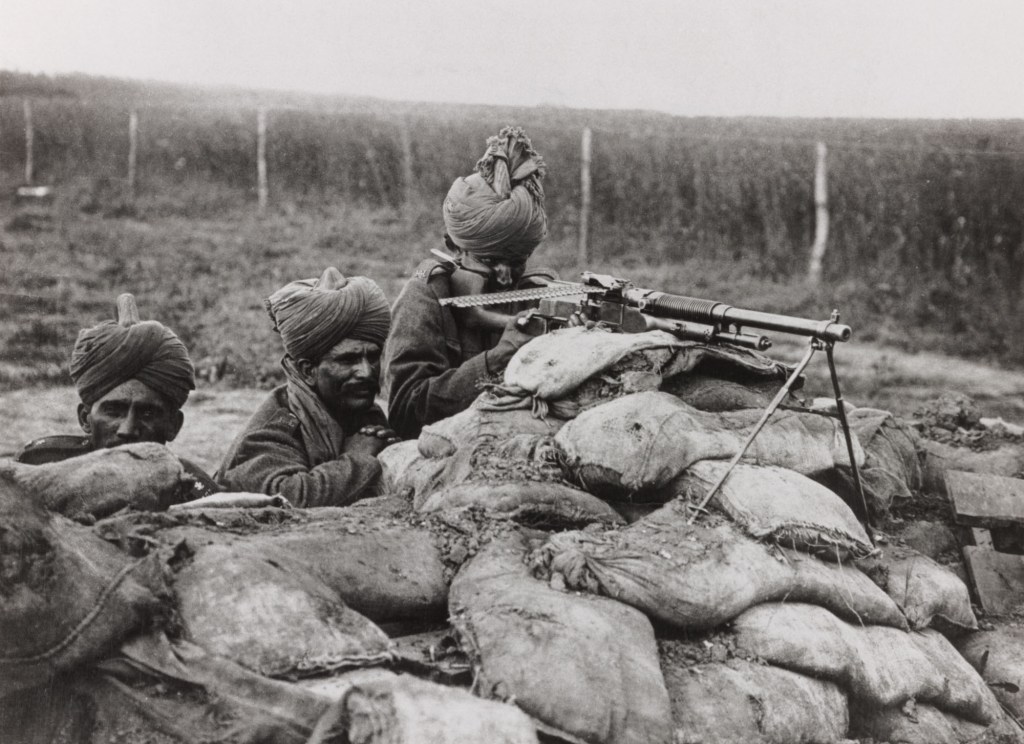Indian gunners with a Hotchkins gun in a trench behind sandbags, WWI. Britain used troops from India in the campaigns on the Western Front and in the Middle East against the Ottoman Empire. (Photo by Daily Herald Archive/National Science and Media Museum/SSPL via Getty Images)