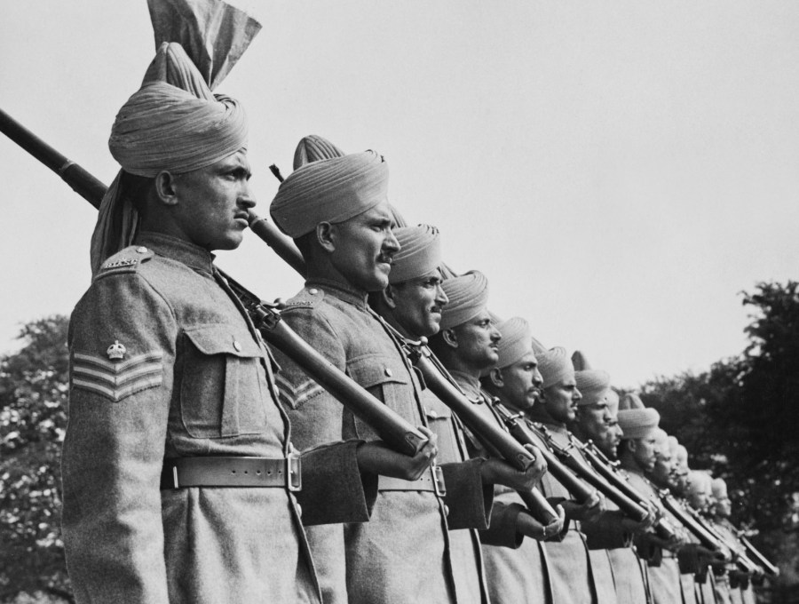 Soldiers of the Royal Indian Army Service Corps (RIASC) on parade at their camp in the north of England, 2nd September 1940. (Photo by Fox Photos/Hulton Archive/Getty Images)