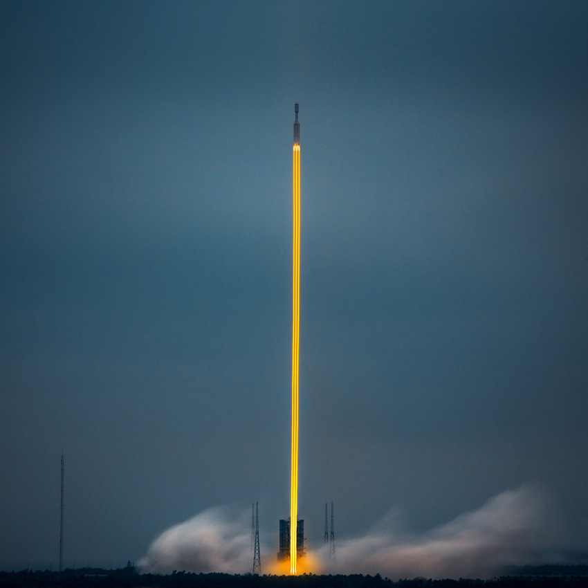 square landscape with rocket launch in centre