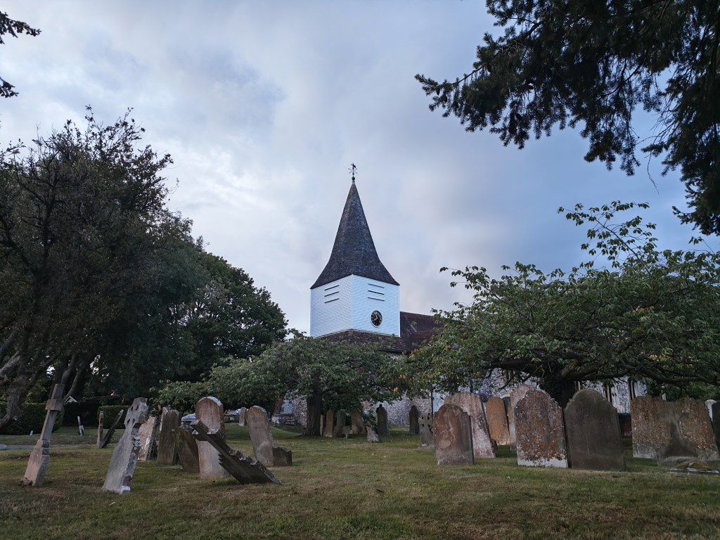cemetery and church in low light