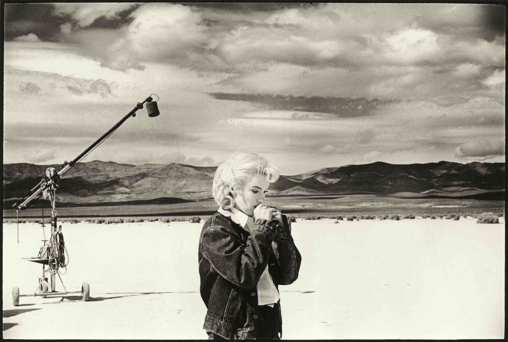 Marilyn Monroe going over lines for a difficult scene she is about to play with Clark Gable in the Nevada desert for The Misfits, 1960