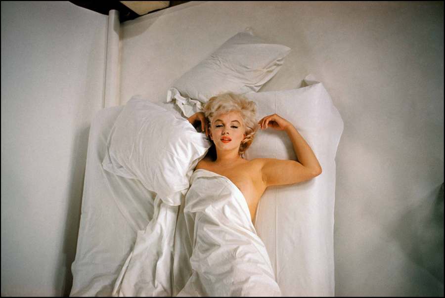 Marilyn Monroe under the sheets during a photographic studio session for The Misfits, Paramount Gallery, Hollywood, LA, 1960