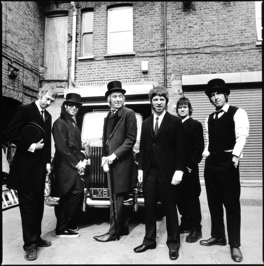 Oasis with Rhys Ifans at The Importance of Being Idle video shoot, Ladbroke Grove, London, 2005 © Lawrence Watson/Print Matters SINGLE USE ONLY