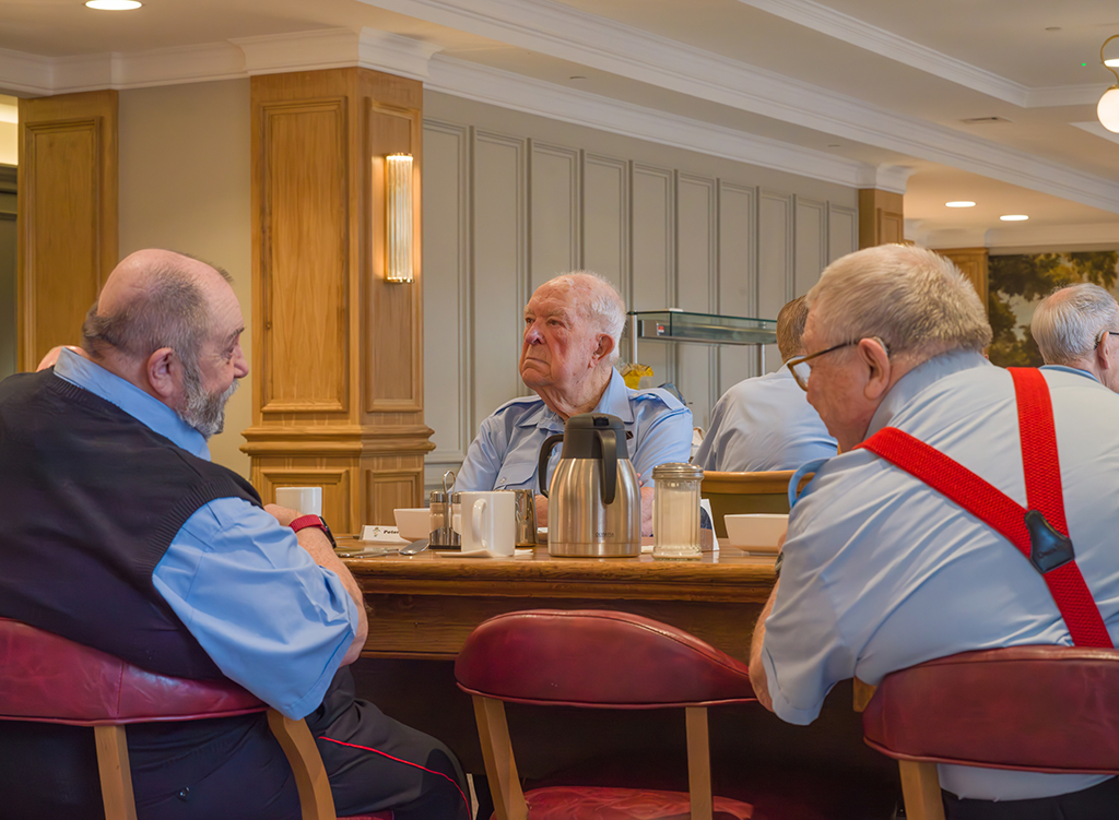 older men sat at a table