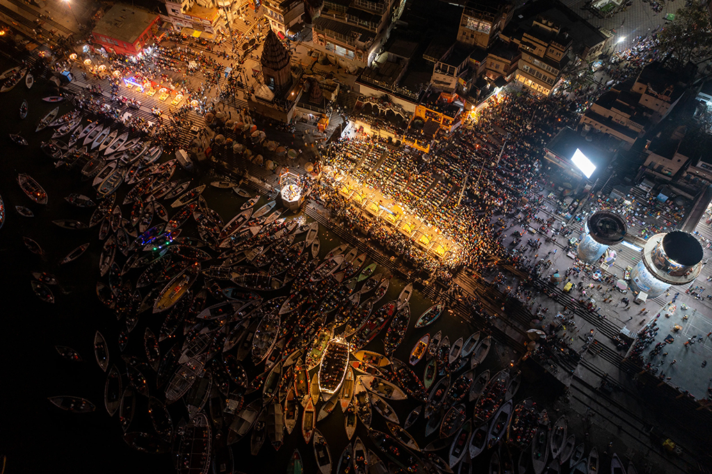 drone photo over busy night scene on the street