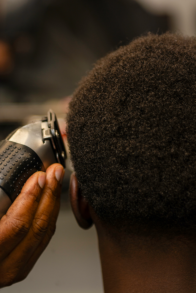 close up of hair being shaved
