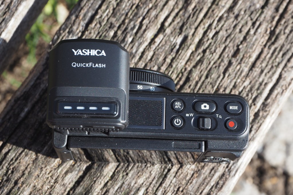 Yashica City 300 compact camera, top down with flash mounted