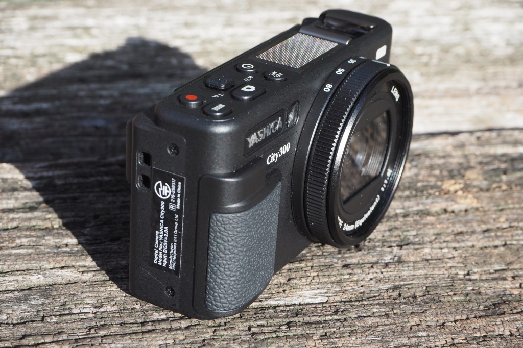 Yashica City 300 compact camera, three quarters view with handgrip