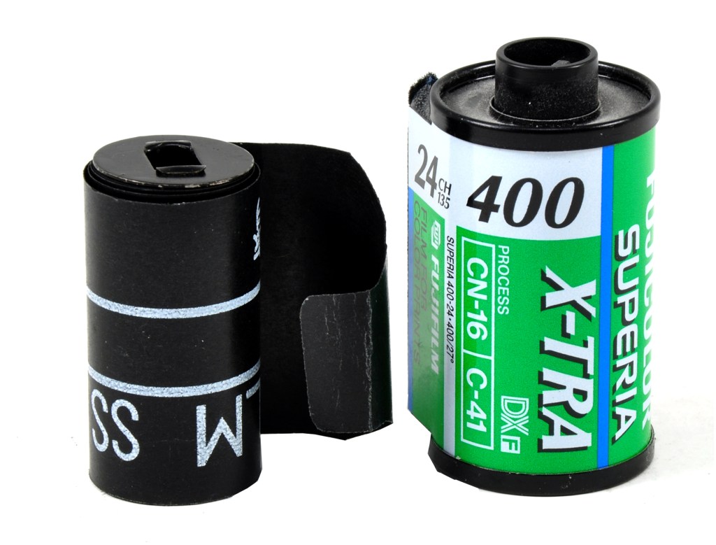 Bolta roll film (left) compared to a standard 35mm cassette