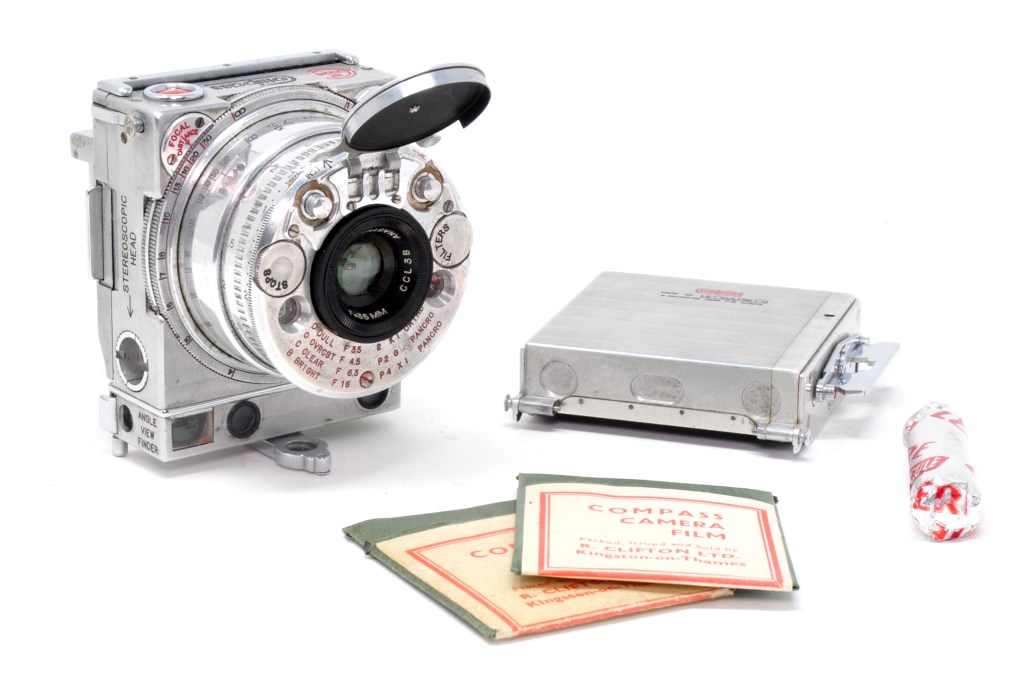 Compass camera with Compass sheet film, roll film and the camera’s purpose-made roll film back