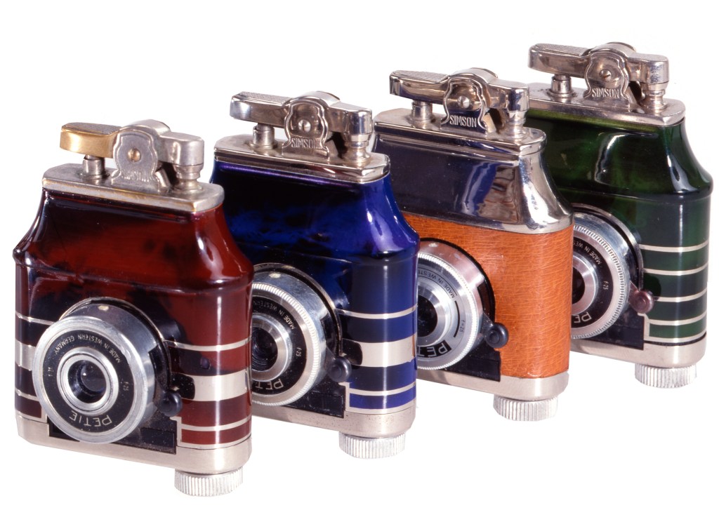 Petie cameras incorporated into Art Deco style cigarette lighters