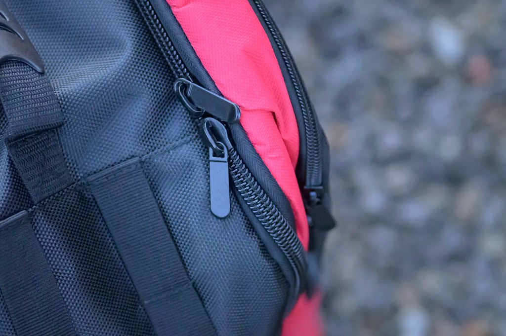 Cheap vs Pro camera bag, zips