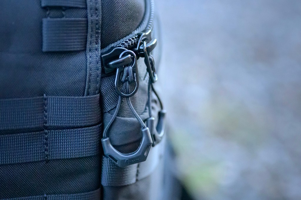 Cheap vs Pro camera bag, zips