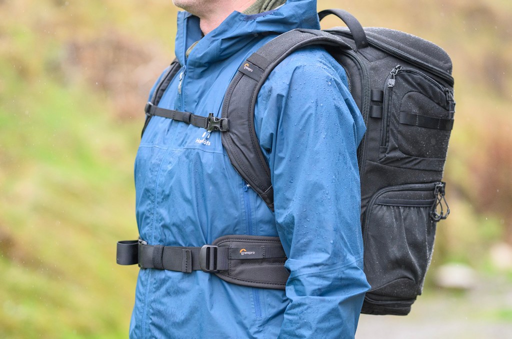 Camera backpack with waist belt and sternum straps