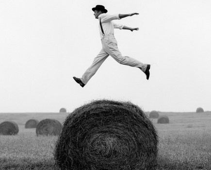 Don Jumping over Hay Roll No. 1, Monkton, Maryland, 1999. Image Credit: Rodney Smith