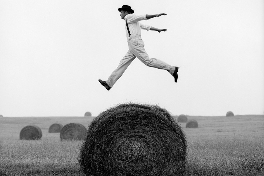 Don Jumping over Hay Roll No. 1, Monkton, Maryland, 1999. Image Credit: Rodney Smith