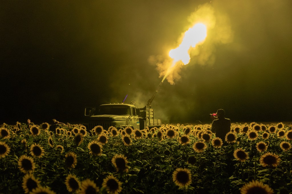 TOPSHOT - Ukrainian servicemen of the 59th brigade mobile air defence unit fire a Soviet made ZU-23 anti-aircraft twin autocannon towards a Russian drone from a sunflower field, during an air attack near Pavlograd, Dnipropetrovsk region on July 19, 2025,. Image Credit: Roman Pilipey/AFP via Getty Images