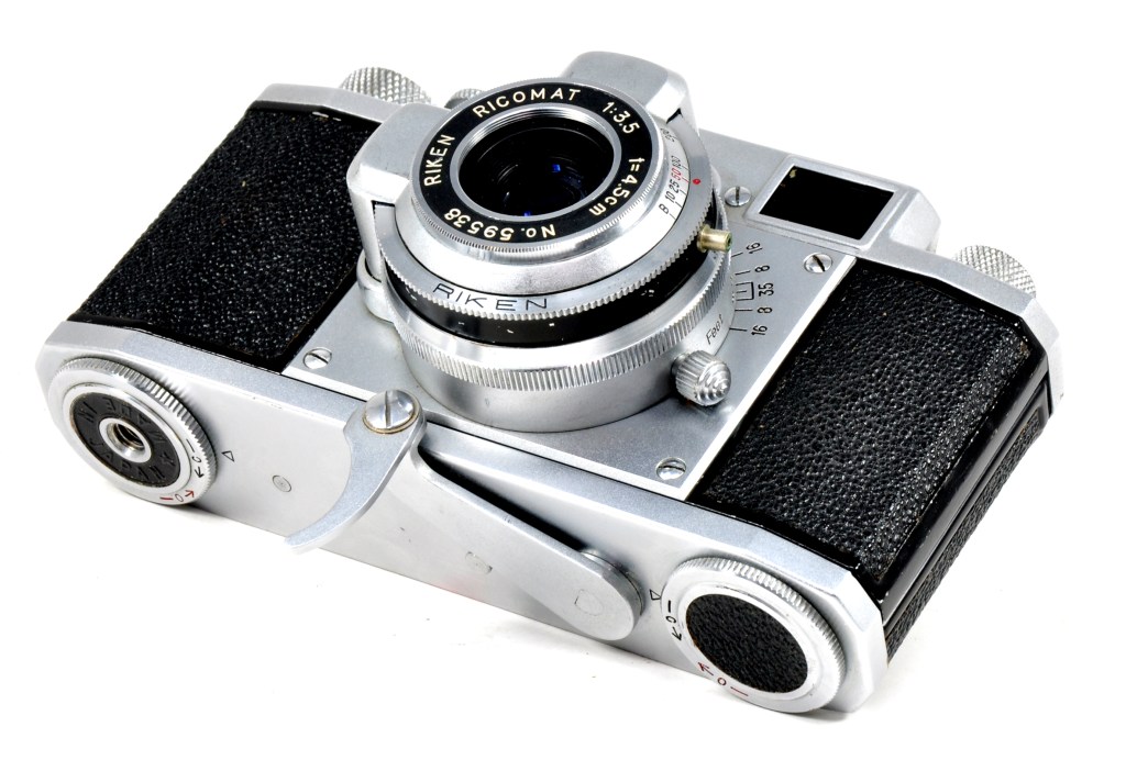On the base, a fold-out lever gives an alternative method of film winding