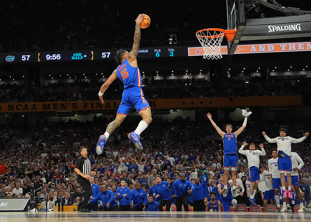 Basketball, Gold Award, Breakaway for the Lead by Bob Donnan. Florida guard Alijah Martin gives the Gators the lead for good on a breakaway score in the semifinals of the NCAA tournament. Image: Bob Donnan