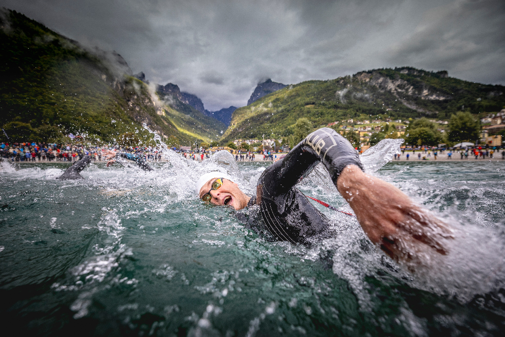 Swimming, Gold Award. Catching a Breath by Carel du Plessis. Image taken at the XTERRA World Championship in Molveno, Italy. Photo features Henry Bramwell-Reeks, a Triathlete from the United Kingdom. This was taken during the swim leg of the full-distance triathlon on September 27th 2025. Image: Carel du Plessis