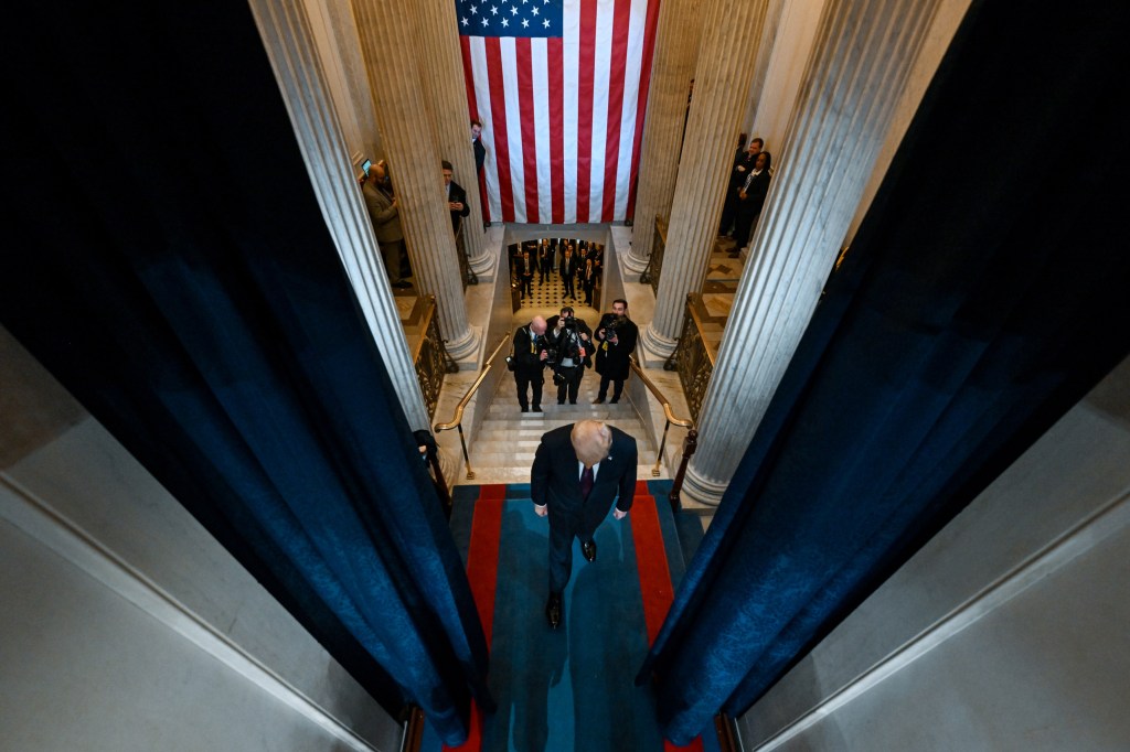 WASHINGTON, DC - JANUARY 20: U.S. President-elect Donald Trump enters the stage for his inauguration in the U.S. Capitol Rotunda on January 20, 2025 in Washington, DC. Donald Trump takes office for his second term as the 47th President of the United States. (Photo by Kenny Holston-Pool/Getty Images)