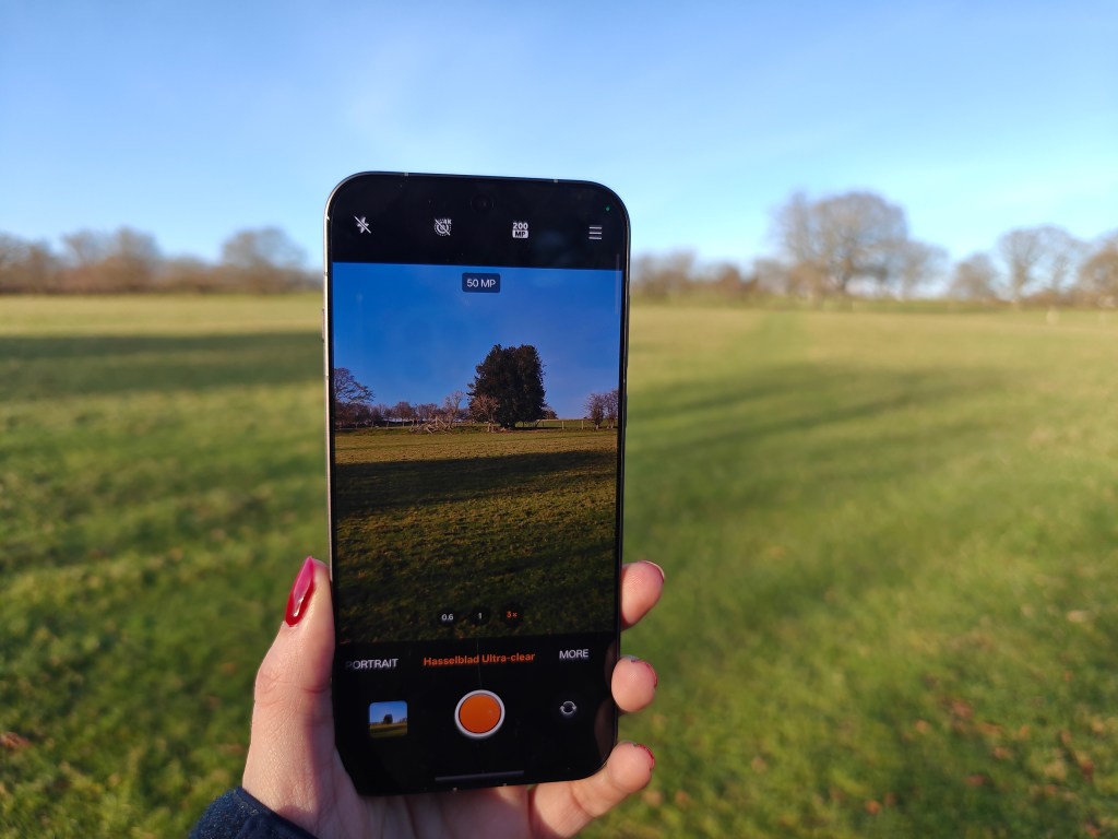 photo of a phone in the middle of a field