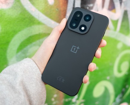 The OnePlus 15 in hand.