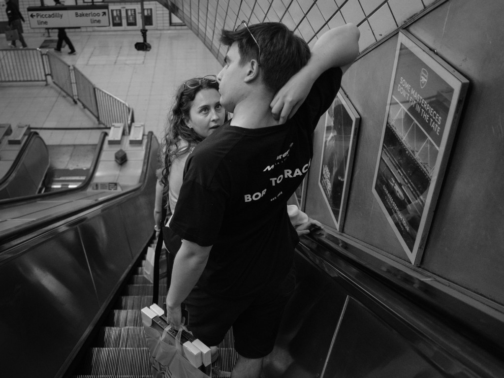Late night conversations on the Underground station’s escalator. London, UK. July 06, 2025. Photo: Edmond Terakopian