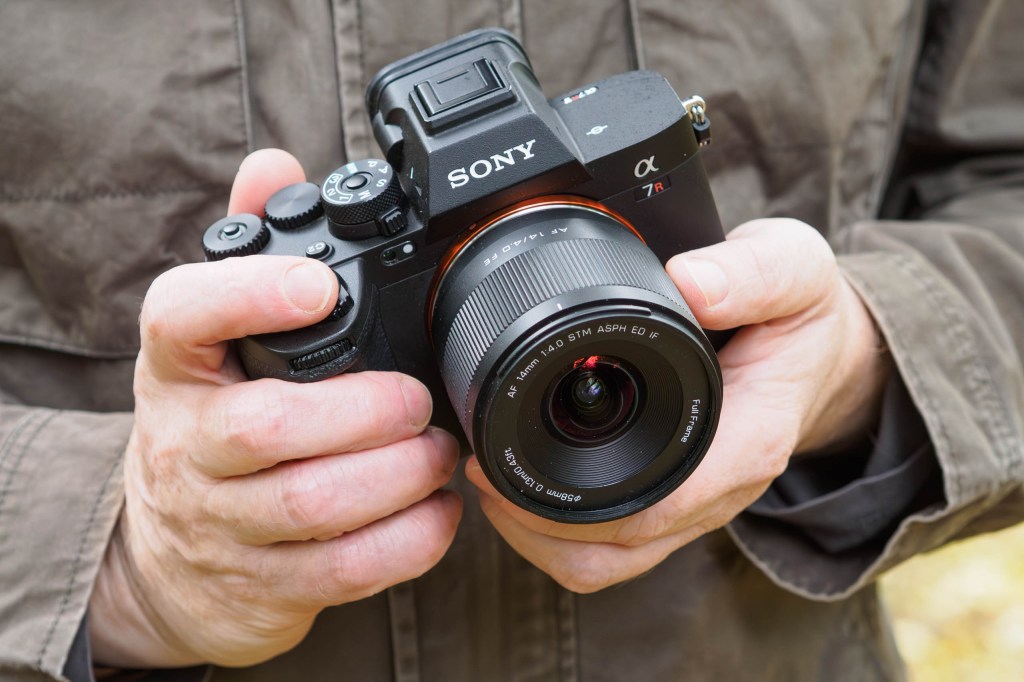 Viltrox AF 14mm f/4 Air in-hand. 