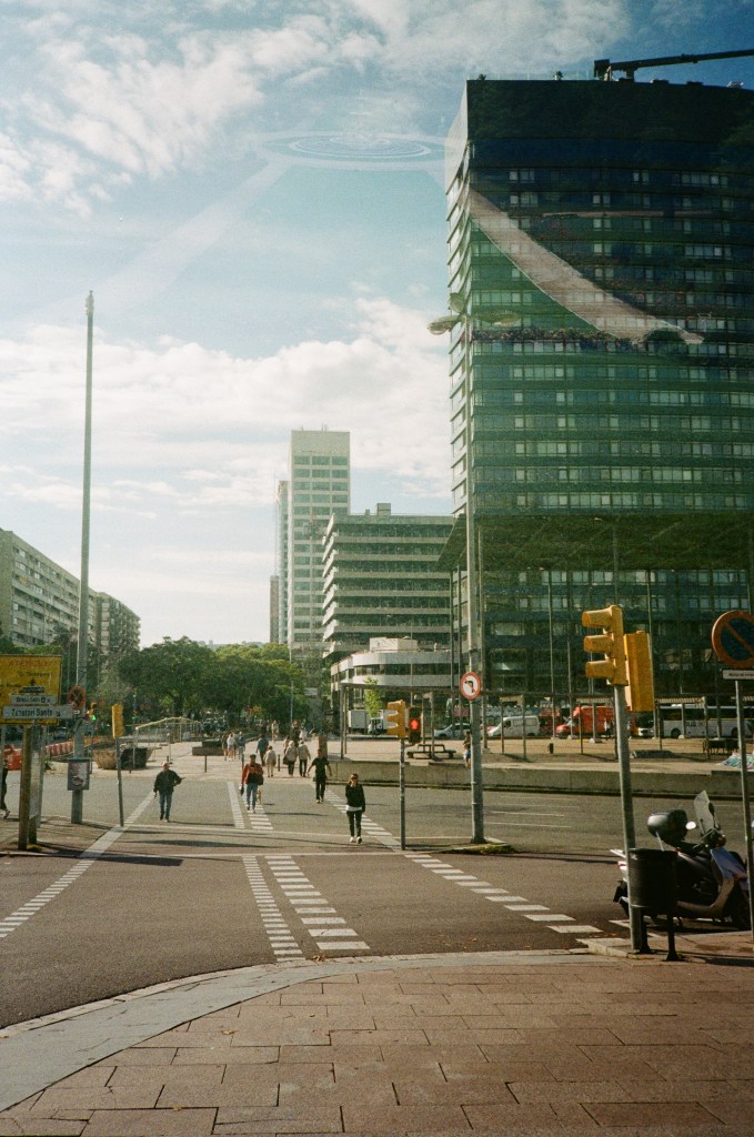 Image of Barcelona taken on Olympus XA2, showing a partial double exposure in the upper quadrant