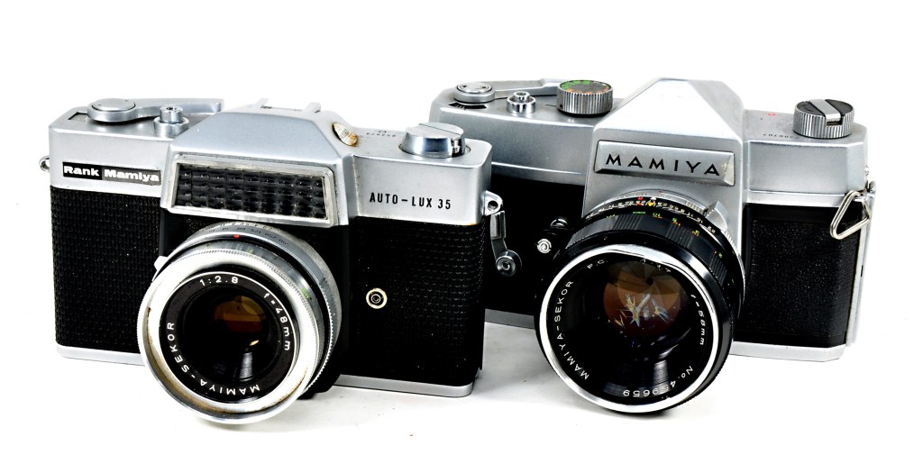 Fixed-lens Mamiya Auto-Lux 35 (left) and interchangeable lens Prismat NP