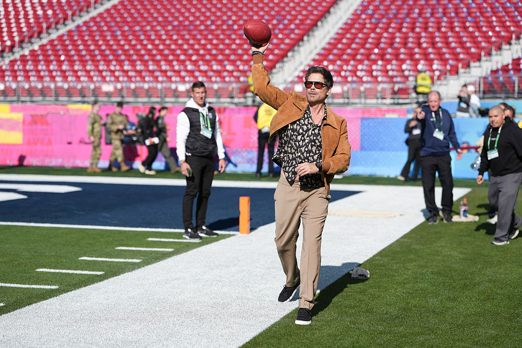SANTA CLARA, CALIFORNIA - FEBRUARY 08: Actor Rob Lowe throws a pass on the sideline prior to the NFL Super Bowl LX football game between New England Patriots and Seattle Seahawks at Levi Stadium on February 8, 2026 in Santa Clara, California. (Photo by Todd Rosenberg/Getty Images)