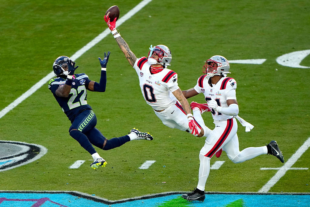 SANTA CLARA, CALIFORNIA - FEBRUARY 08: Christian Gonzalez #0 of the New England Patriots breaks up a pass intended for for Rashid Shaheed #22 of the Seattle Seahawks during the second quarter in Super Bowl LX at Levi's Stadium on February 08, 2026 in Santa Clara, California. (Photo by Thearon W. Henderson/Getty Images)