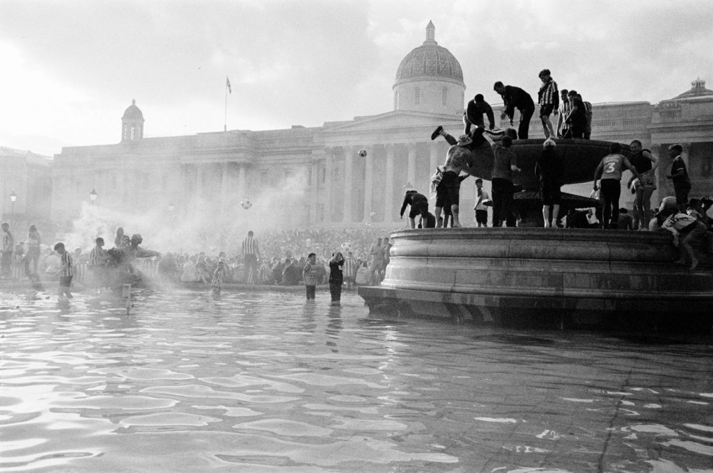 Trafalgar Square, London: Football fans gather for a pre-celebration ahead of the Championship Final.