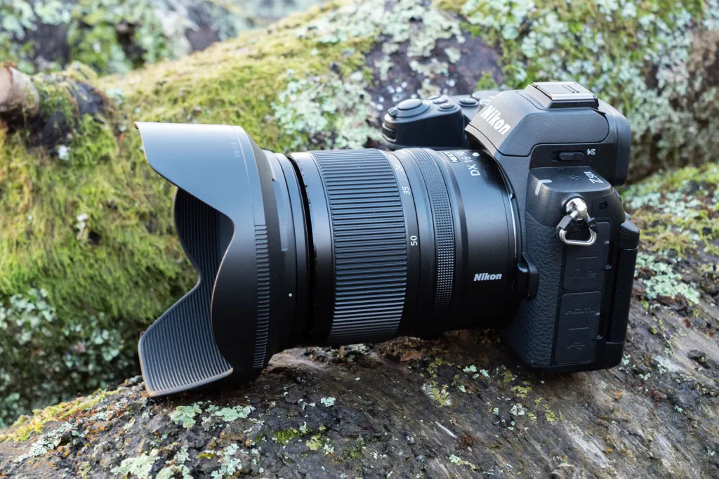 The Nikon 16-50mm f/2.8 DX lens mounted on a Nikon Z50 II as shown from the side