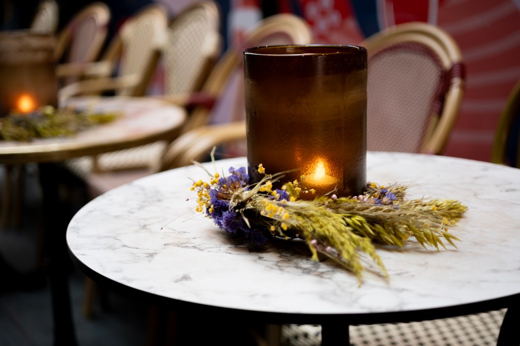 A candle on a table
