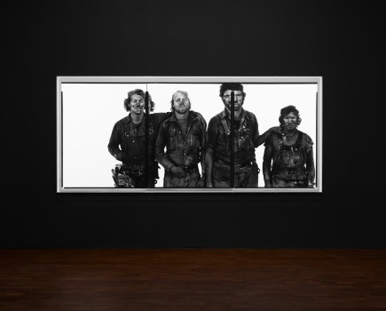 An image of one of Richard Avedon's photographs on display in a gallery