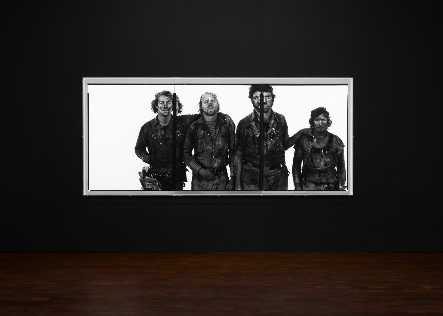 An image of one of Richard Avedon's photographs on display in a gallery