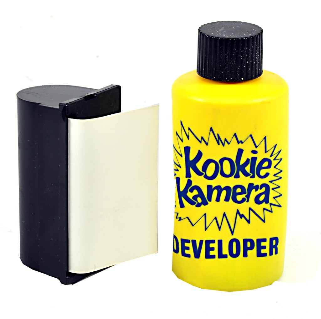 Rarer still: the film paper in its cassette and a bottle of Kookie developer