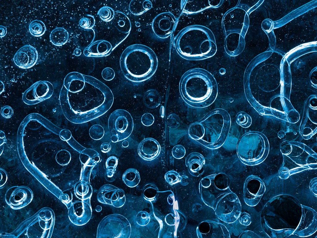 A melting glacier creates ice bubbles