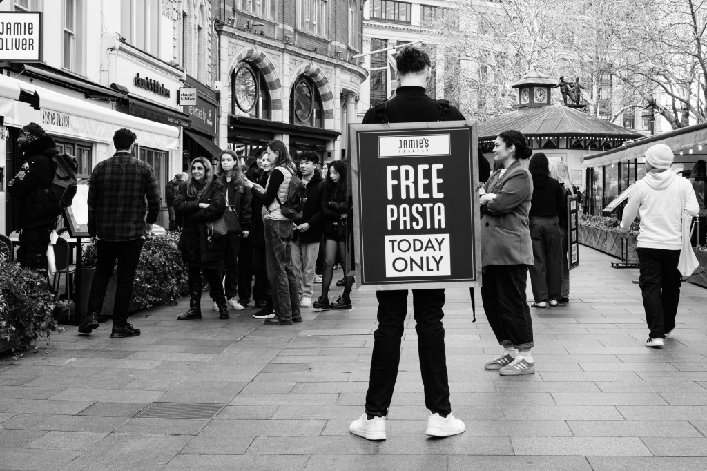 Viltrox TCL-X100VI on Fujifilm X100VI sample image - black & white street photo. 