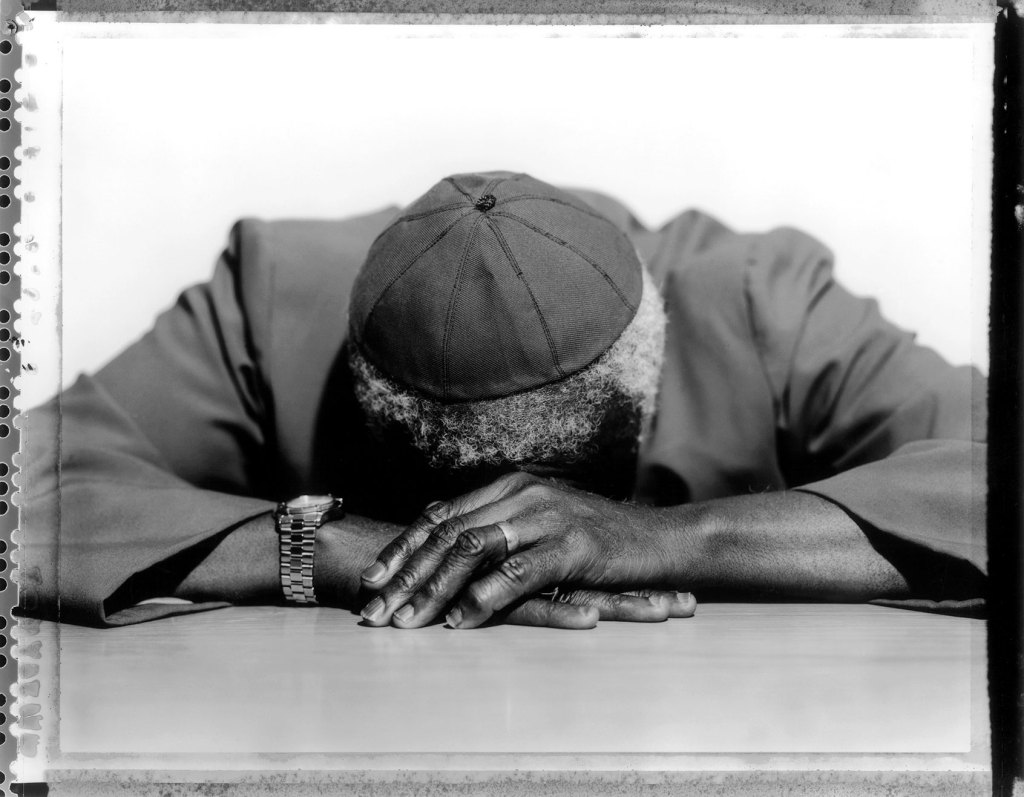 
Bishop Desmond Tutu at the Truth Commission headquarters, Cape Town, South Africa 2000. © Jillian Edelstein/Network
