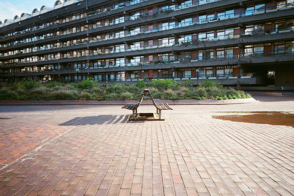 Kodak Snapic A1 sample photograph showing a bench with the Barbican flats in the background